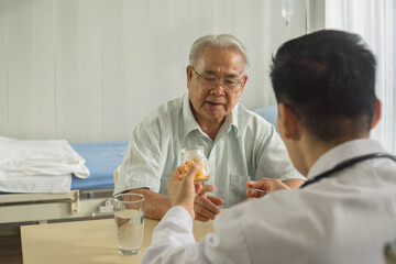 Fototapeta na wymiar Senior man meets doctor Medical consultation