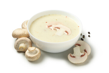 Bowl with tasty mushroom soup isolated on white background