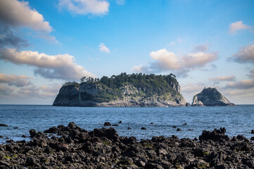 Jeju Island is a representative tourist destination in Korea. This is Beomseom Island seen from Seogwipo Coastal Trail.	