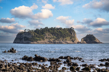 Jeju Island is a representative tourist destination in Korea. This is Beomseom Island seen from Seogwipo Coastal Trail.	
