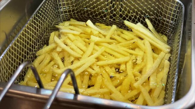 French fries in the deep fryer