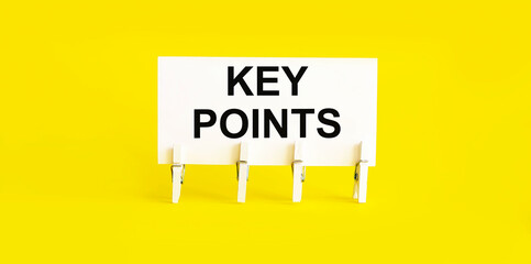 KEY POINTS, written on white sticky note on yellow background