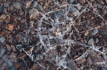 The texture of the stones under the ice