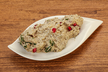 Vagan dietary cusine - mutabal with granet seeds