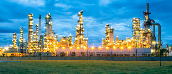 Chemical oil refinery plant, power plant at sunset sky for industry concept.