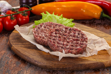 Raw burger cutlet