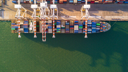 Fototapeta na wymiar Aerial top view commercial dock freight transportation global business, Container ship business seafreight logistics import export freight shipping, Container vessel cargo freight ship port of loading