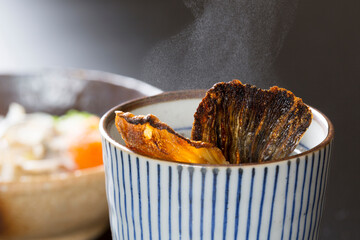 フグのひれ酒 © Paylessimages