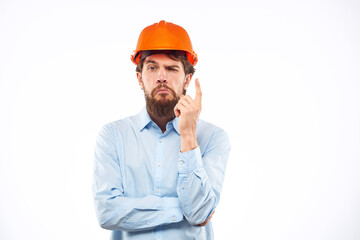 Man in working uniform orange hard hat lifestyle official