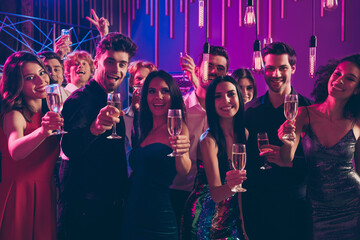 Cheers Photo portrait of people holding champagne glasses to camera greeting together each other holding glasses