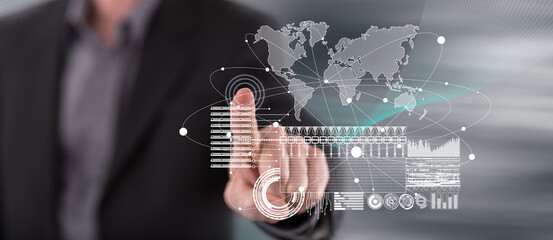 Man touching a global business digital interface concept