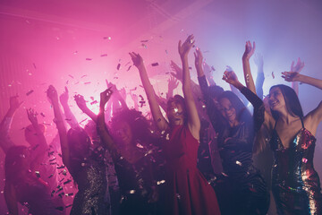 Photo of big company many fancy girls falling glitter raise arms red dress neon bright pink...