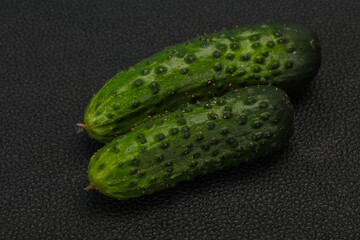 Ripe fresh green two cucumbers
