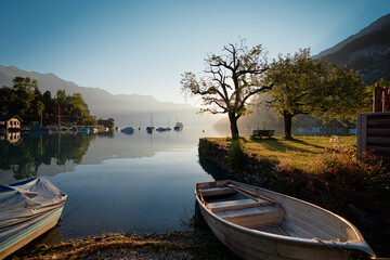 Wooden fishing boat on the bay of Brienz lake, Switzerland.