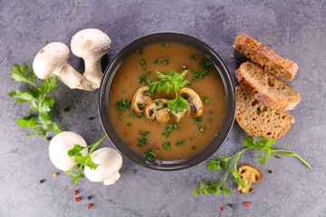 mushroom soup in bowl with parsley