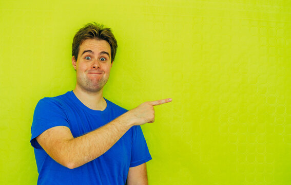 Stupid Silly Nerd Face Pointing Out Blank Space Green Background