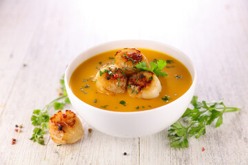 soup with fried scallop and herbs