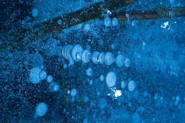 Close-up large and small white air bubbles