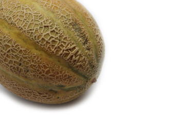 Fresh whole ripe melon isolated on white background. Cucumis melo 