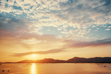 Beautiful landscape. Colorful sunset on the sea shore.