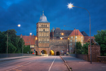 Lubeck, Germany. Burgtor - northern gate of the old town (HDR image at dusk)