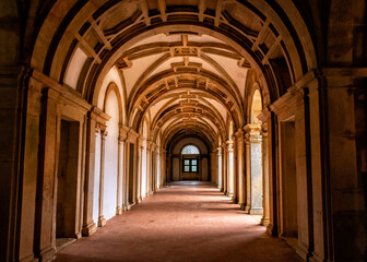 Fototapeta na wymiar Castle Hallway With Outside Light And Ribbed Vaulted Ceiling. Tomar, Portugal.