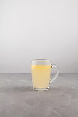 Homemade beef bone broth with natural collagen in mug. Selective focus, copy space