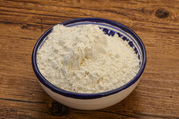 Wheat flour heap in the bowl