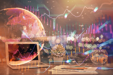 Multi exposure of graph and financial info and work space with computer background. Concept of international online trading.