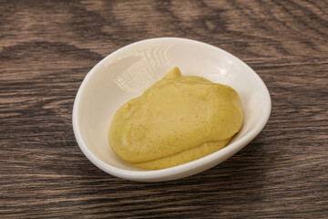 Dijon mustard sauce in the bowl