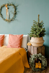New Year design interior with christmas tree, spruce branches. Traditional winter holidays Christmas / New Year.