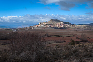 Landscape of the medieval village of Atienza with a cloudy blue sky, Guadalajara, Spain