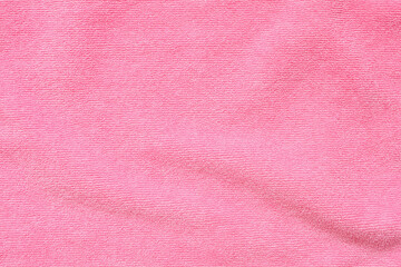 Pink towel fabric texture surface close up background