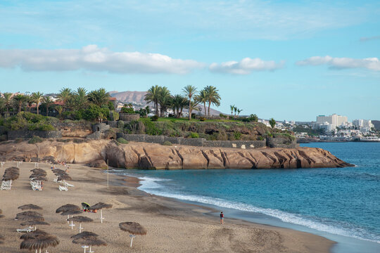 Views of Playa del Duque towards Las Americas coast, a popular beach visited by thousands of tourists yearly, but with only few people now due to the global lockdown, Tenerife, Canary Islands, Spain