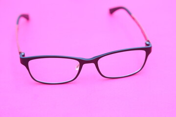 glasses on the pink scene.
