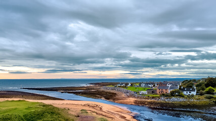 Brora and the mouth of the River Brora at low tide looking out over the North Sea