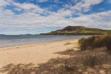 Fototapeta na wymiar Seven Mile beach a pristine golden sand beach just outside of the city of Hobart in Tasmania, Australia