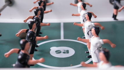 Top Down View Close-Up on Fooseball Table Players Facing Each Other