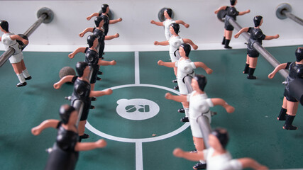 Top Down View Close-Up on Fooseball Table Players Facing Each Other