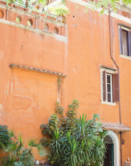 Fototapeta na wymiar Facade of old house in Rome