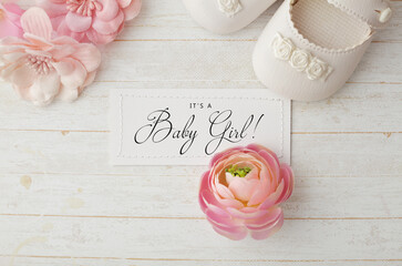 baby girl shoes and flowers. baby shower decoration, greeting card