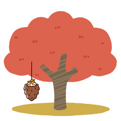 秋の木からぶら下がるミノムシ