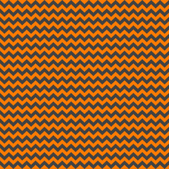 Zig zag Halloween pattern. Regular chevron stripes of orange and gray color. Classic zigzag lines abstract geometry background. Seamless texture print. Vector illustration