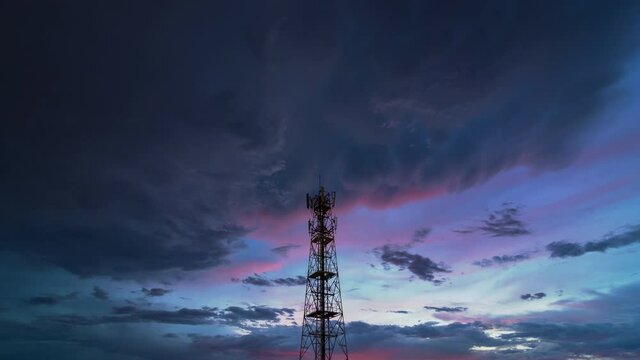 Evening sky motion video that changes over telecommunication towers