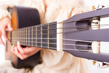 classical guitar detail with shallow depth of field