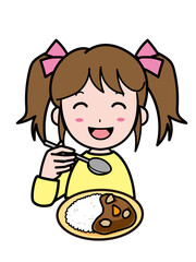 笑顔でカレーライスを食べる少女