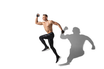Fototapeta na wymiar Running, jumping high. Stylish young male athlete on white studio background, portrait with shadows. Sportive fit model in motion and action. Body building, healthy lifestyle, style concept.