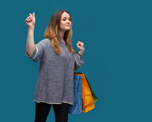 Young pretty girl with shopping bags