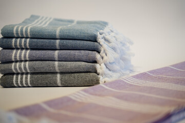 Colorful Turkish bath towels with a white background.