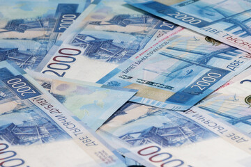 A lot of money, banknotes with a face value of 2000 Russian rubles, close-up. Money Fund, selective focus